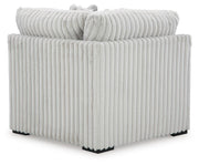Ashley Furniture Stupendous sectional sofa with plush cushions and modern design, shown from the back view.