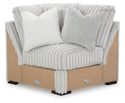 Ashley Furniture Stupendous sectional sofa with plush cushions and modern design, shown from a head-on view.