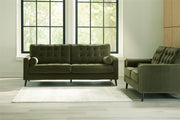 Ashley Furniture Reveon Lakes living room set featuring a sectional sofa and matching armchair in a modern design.