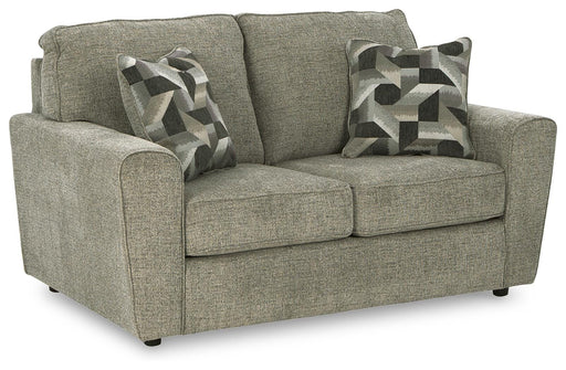 Ashley Furniture Cascilla loveseat with plush fabric and cushioned armrests, shown from an angled view.