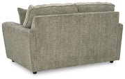 Ashley Furniture Cascilla living room set with sofa and loveseat, featuring plush cushions and stylish upholstery.