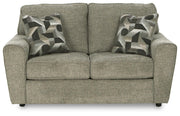 Ashley Furniture Cascilla living room set with sofa and armchair, featuring neutral upholstery and modern design.