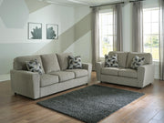 Ashley Furniture Cascilla living room set with sofa, loveseat, and armchair in a modern fabric upholstery arrangement.