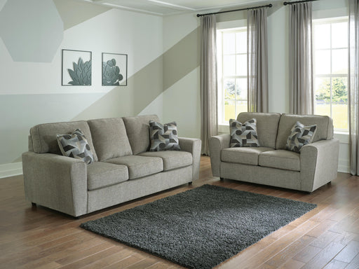 Ashley Furniture Cascilla living room set with sofa, loveseat, and armchair in a modern fabric upholstery arrangement.