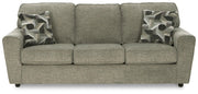 Ashley Furniture Cascilla living room set featuring a sofa and armchair with neutral upholstery and contemporary design.
