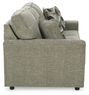Ashley Furniture Cascilla living room set featuring a sofa and loveseat with plush cushions and modern design.