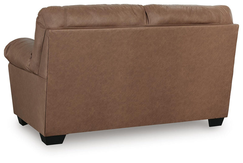 Ashley Furniture WillowBend living room set featuring a plush sofa and matching armchair in a cozy, stylish design.