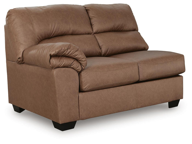 Ashley Furniture WillowBend Sectional sofa, angled view showing plush cushions and modern design in a living room setting.