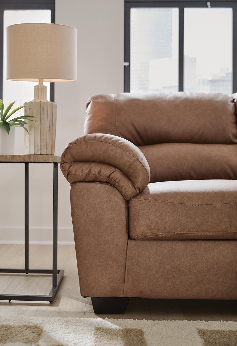 Close-up of the armrest on the Ashley Furniture WillowBend Sofa, showcasing its plush fabric and detailed stitching.