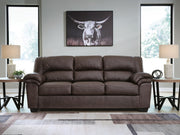 Ashley Furniture WillowBend living room set featuring a sofa and armchair with neutral upholstery and wooden accents.