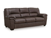 Ashley Furniture WillowBend living room set with sofa, loveseat, and coffee table arranged in a stylish living space.