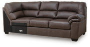 Ashley Furniture WillowBend sectional sofa shown from an angle, featuring plush cushions and modern design in a cozy living room setting.