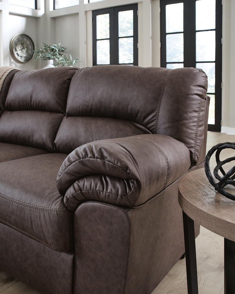 Close-up of Ashley Furniture WillowBend Sectional arm with detailed upholstery and stitching.