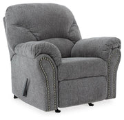 Ashley Furniture Allmaxx living room set with sofa, loveseat, and coffee table, viewed from an angle in a modern living space.