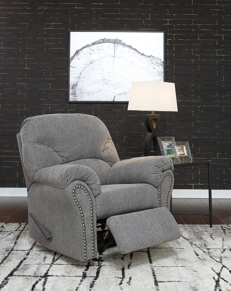 Ashley Furniture Allmaxx living room set with sofa, loveseat, and coffee table arranged in a modern living space.