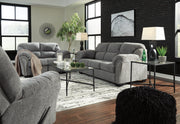 Ashley Furniture Allmaxx living room set featuring a sofa and armchair with neutral upholstery and modern design.