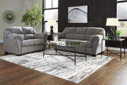 Ashley Furniture Allmaxx living room set featuring a sofa and armchair with plush cushions and modern design.