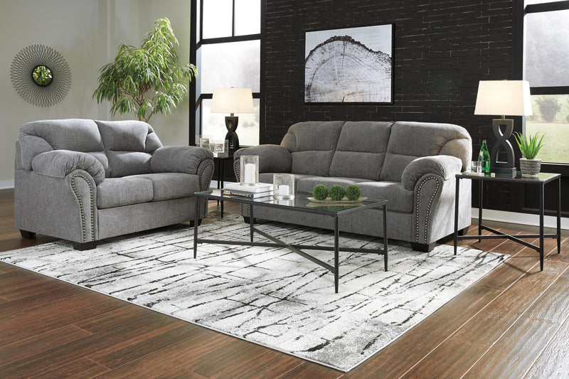 Ashley Furniture Allmaxx living room set featuring a sofa and armchair with plush cushions and modern design.