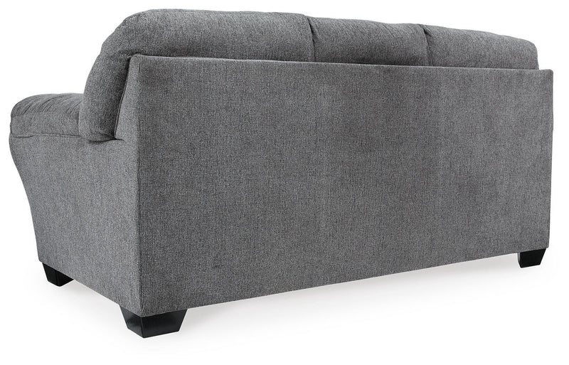 Ashley Furniture Allmaxx sofa with plush cushions and modern design, shown from the back view in the image.