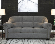 Ashley Furniture Allmaxx sofa, stylish and comfortable beige fabric sofa with plush cushions and wooden legs.