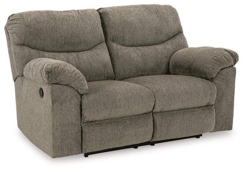 Ashley Furniture Alphons living room set featuring a modern sofa, loveseat, and armchair with neutral upholstery.