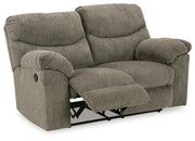 Open-angle view of Ashley Furniture Alphons living room set with sofa and chairs, showcasing modern upholstery and stylish design.