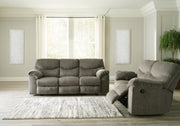 Ashley Furniture Alphons living room set with sofa and armchair, featuring neutral upholstery and modern design.