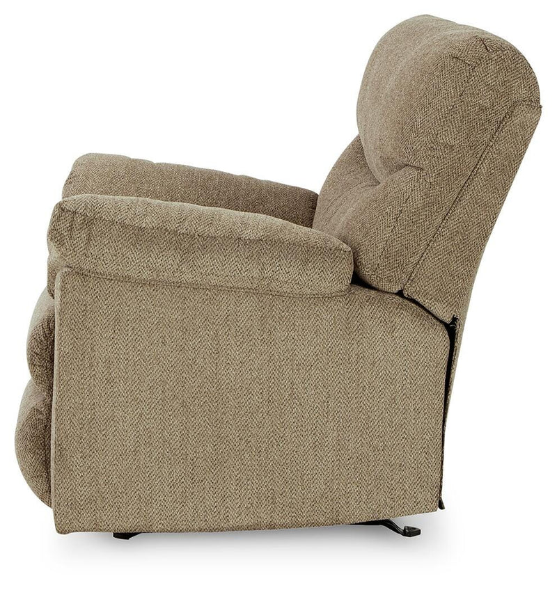 Side view of the Ashley Furniture Alphons living room set featuring a sofa and armchair with neutral upholstery and wooden legs.