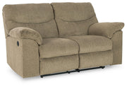 Ashley Furniture Alphons living room set featuring a sofa, loveseat, and armchair arranged in a modern living space.