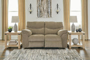 Ashley Furniture Alphons Living Room Set featuring a sectional sofa and matching armchair in a modern design.