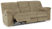 Ashley Furniture Alphons living room set with open sectional sofa and matching coffee table in a modern living space.