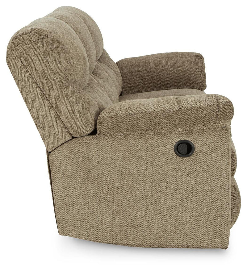 Ashley Furniture Alphons living room set featuring a sofa and armchair with neutral upholstery and modern design.