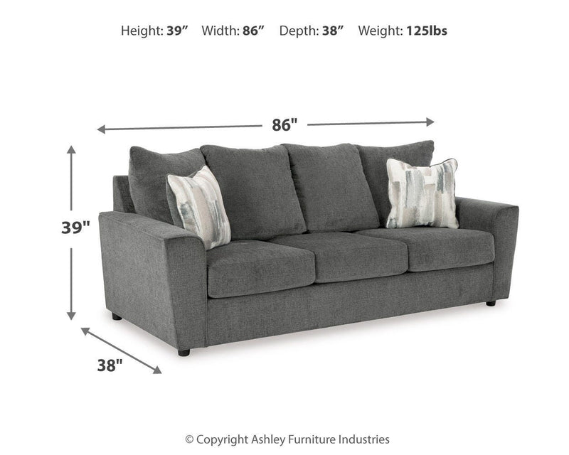 Ashley Furniture Stairatt living room set with sofa and armchair, featuring plush upholstery and modern design.
