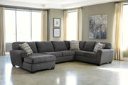 Ashley Furniture Ambee living room set featuring a sofa, loveseat, and coffee table arranged in a modern living space.