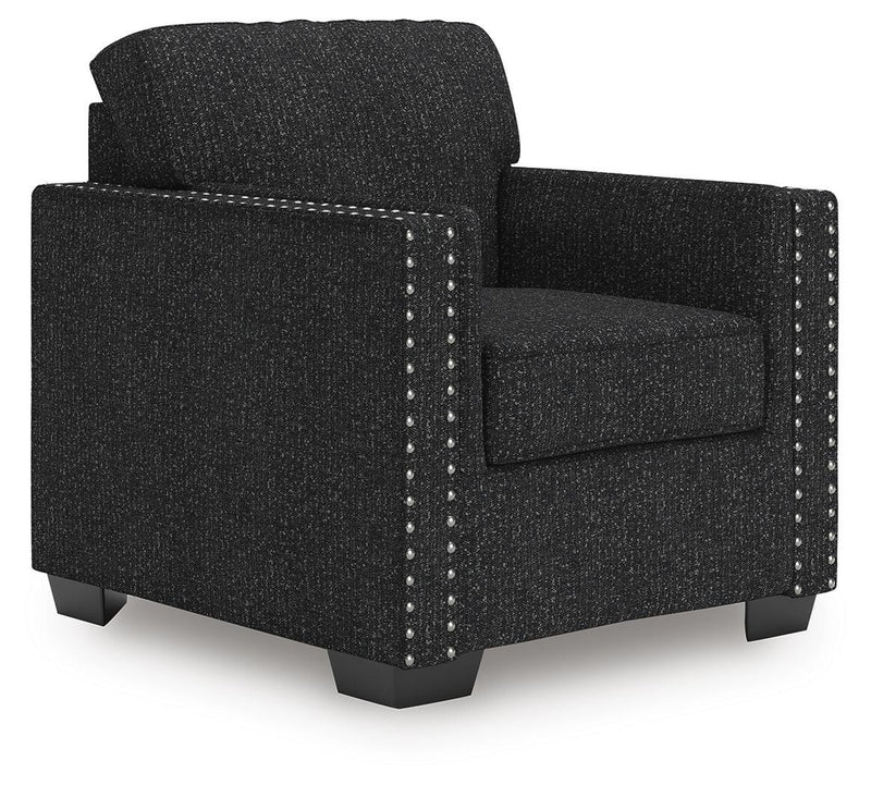 Ashley Furniture Jasmine Peaks Chair with plush fabric and wooden legs, shown from an angled view.