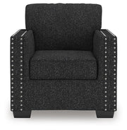 Ashley Furniture Jasmine Peaks Chair with plush fabric upholstery and wooden legs, shown from a front head-on view.