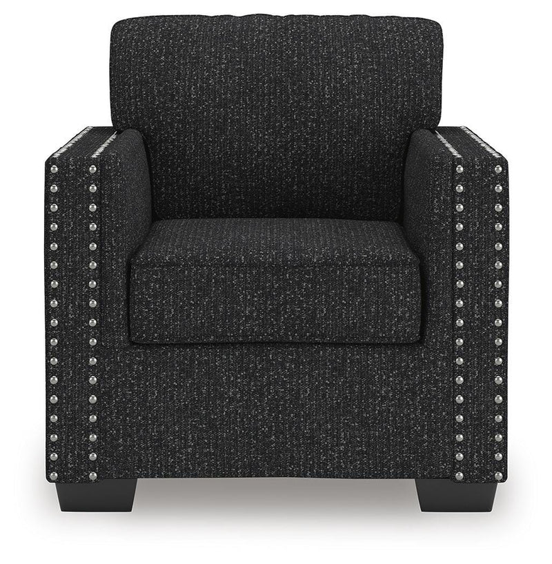 Ashley Furniture Jasmine Peaks Chair with plush fabric upholstery and wooden legs, shown from a front head-on view.