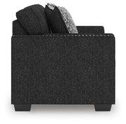 Ashley Furniture Jasmine Peaks loveseat with plush upholstery and cozy armrests, perfect for small living rooms.