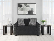 Jasmine Peaks Ashley Furniture loveseat with plush beige upholstery and cushioned back for comfortable seating.