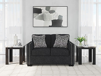 Jasmine Peaks Ashley Furniture loveseat with plush beige upholstery and cushioned back for comfortable seating.