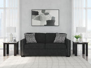 Ashley Furniture Jasmine Peaks Sofa, plush fabric sofa with tufted cushions, in a neutral color, showcasing elegant living room style.