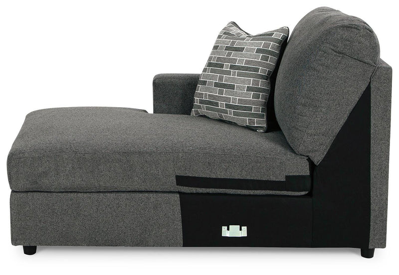 Ashley Furniture Edenfield living room set with a sectional sofa and matching ottoman in a modern, neutral fabric.