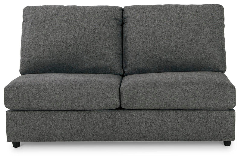 Ashley Furniture Edenfield living room set with sofa and armchair, featuring neutral upholstery and plush cushions.