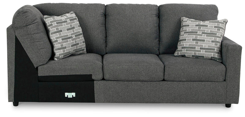 Ashley Furniture Edenfield living room set featuring a sofa and armchair with neutral fabric upholstery and modern design.