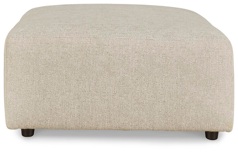 Ashley Furniture Edenfield living room set with plush sofas and coordinating coffee table, shown from a front head-on view.