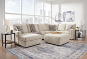 Ashley Furniture Edenfield living room set featuring a sofa, loveseat, and armchair with neutral fabric upholstery and wooden legs.