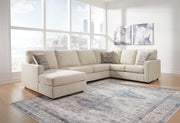 Ashley Furniture Edenfield living room set with beige sofa and armchair in a modern design, featuring plush cushions and stylish fabric.