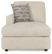 Ashley Furniture Edenfield 3-piece sectional with chaise, showing plush fabric, wide armrests, and modern design for comfortable seating.