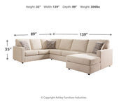 Ashley Edenfield living room set with a plush sofa and matching armchair, featuring neutral upholstery and wooden legs.