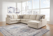 Ashley Furniture Edenfield living room set featuring a sofa and armchair with neutral fabric and wooden legs.